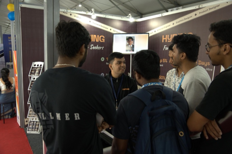 Rishabh Pandya presenting at a Hyring expo booth